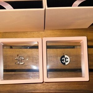 Chanel Black and Gold Logo Pendants